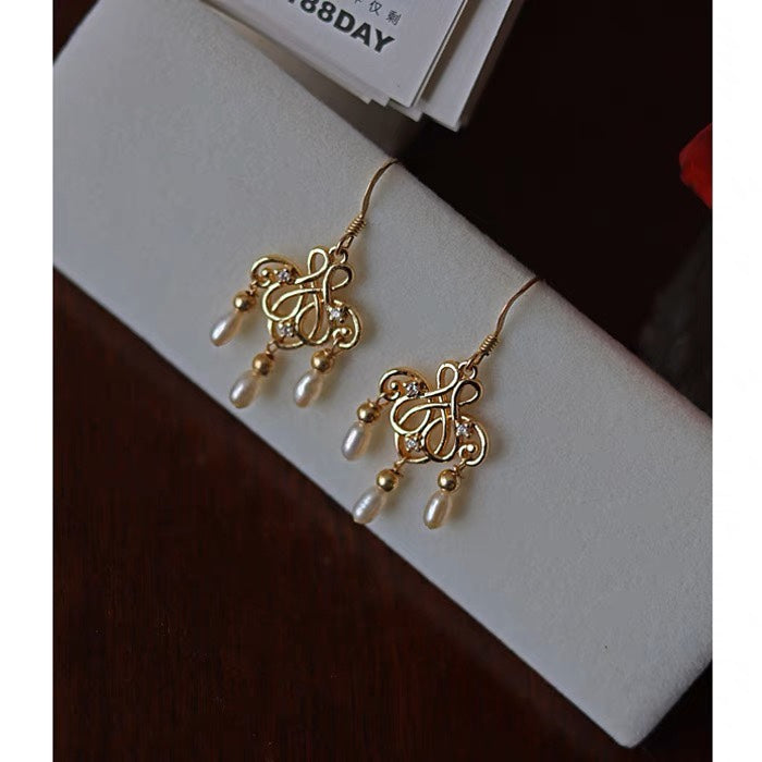 Conception raffinée Boucles d'oreilles en perles naturelles avec franges de style rétro palatial en or 14K et brillants élégants mode tendance