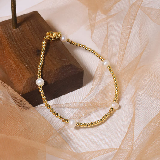 Bracelet en perles d'eau douce naturelles au style rétro français, minimaliste et léger luxe, plaqué or 18K en cuivre, pour un public de niche, style européen et américain