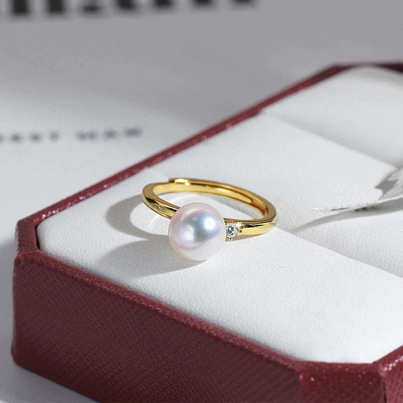 Bague en argent sterling S925, style sobre et élégant, ornée d'une perle naturelle d'eau douce de 8 à 9 mm. Bijou original et personnalisable.