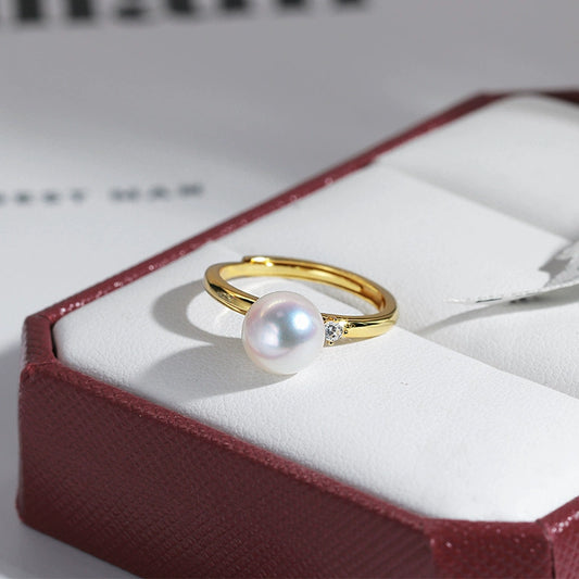 Bague en argent sterling S925, style sobre et élégant, ornée d'une perle naturelle d'eau douce de 8 à 9 mm. Bijou original et personnalisable.