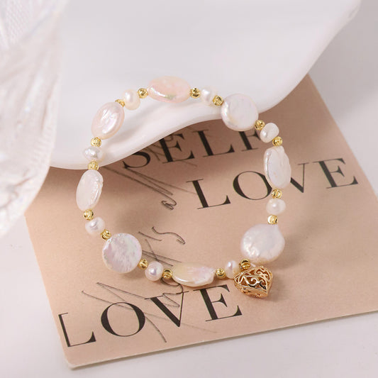 Bracelet en perles baroques naturelles avec design en cœur ajouré, style ins, sensation haut de gamme, polyvalent et simple.